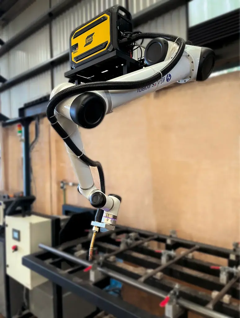 Sistema de soldadura robotizado con mesa de soldadura rotativa